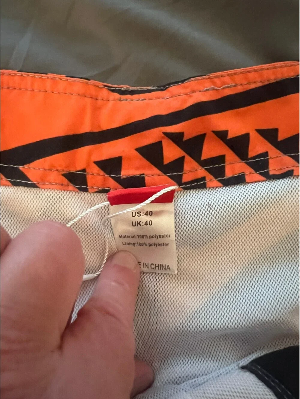 Mens Tribal orange swimtrunks with unique design size 40